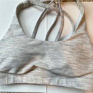 Great condition.  Lululemon energy bra size 4.  Grey and white stripe.